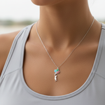 Silver necklace tiny pendant on model
